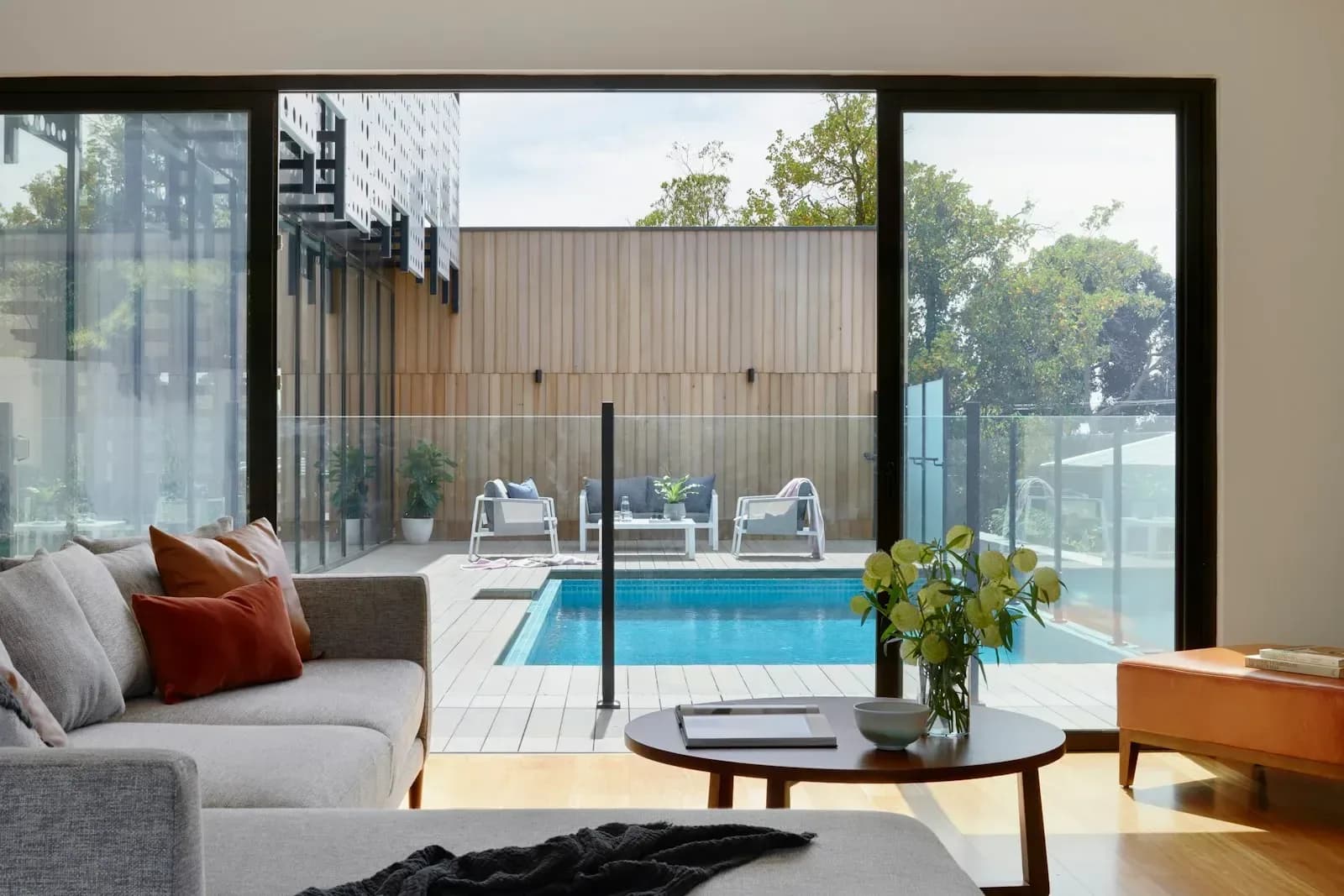 Rear extension opened to the garden through minimal-frame sliding glass