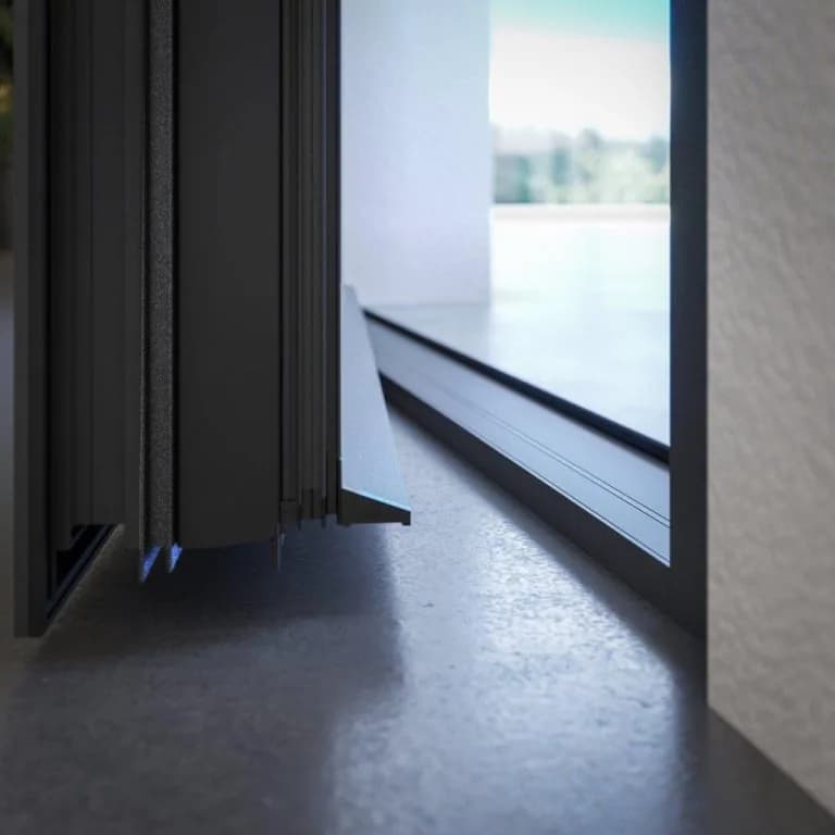 Complete sealing of entrance doors from air and water with a low threshold and gaskets