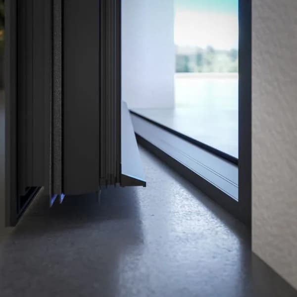 Complete sealing of entrance doors from air and water with a low threshold and gaskets